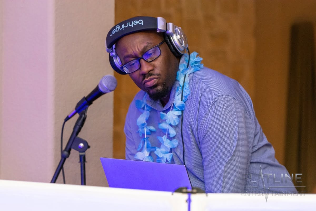 Mark Anthony checking the microphone and headphones before the party starts